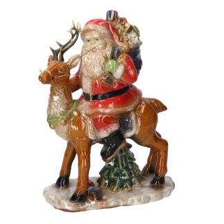 Babbo natale ceramica su renna cm23x13h31