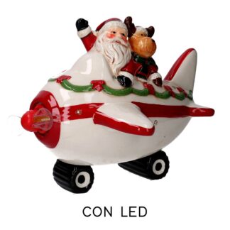 Babbo natale ceramica aereo led ,scritta olografica e musica bianco cm22x25,5h20